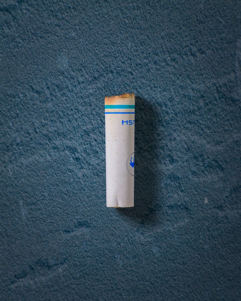 cigarette butt on texture background